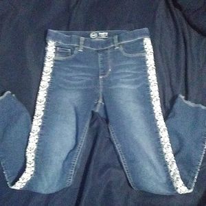 Girls jeggings with white lace detail.